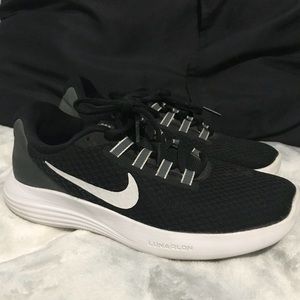 Women’s Nike black lunarlon tennis shoes